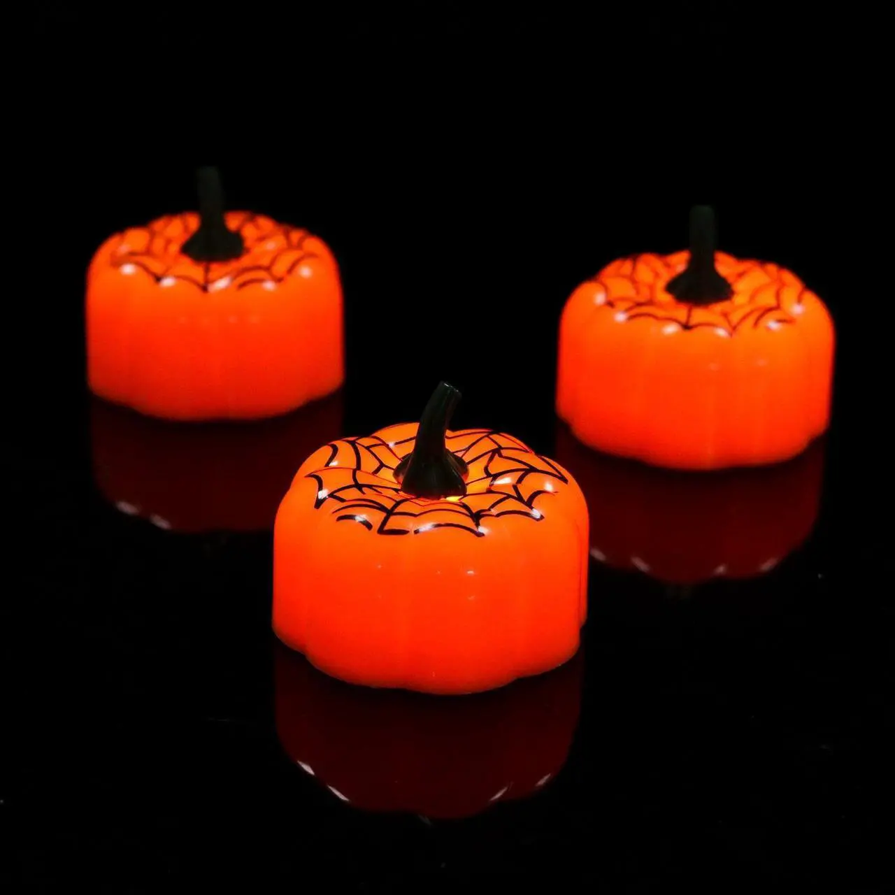 Alt view image 4 of 7 - IMAGE 12 Packs LED Pumpkin Lights Battery Operated Pumpkin Tealight Candles for Halloween, Christmas, Thanksgiving and Theme Parties