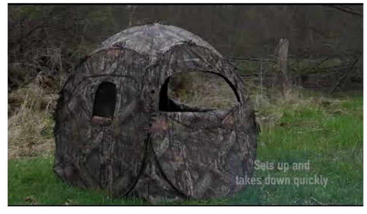 Alt view image 4 of 5 - Ameristep 60 x 60 x 66-Inch Doghouse Fire Retardant Spring Steel 2-Person Ground Blind with 8 Window Openings and ShadowGuard Coating (3D Edge ReLeaf)