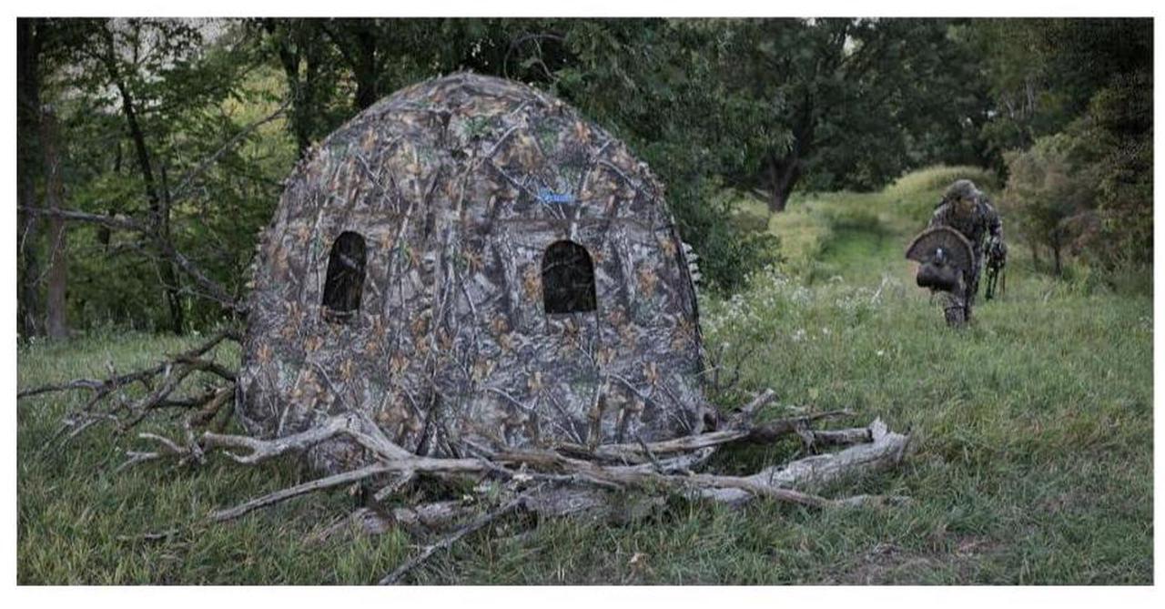 Alt view image 5 of 5 - Ameristep 60 x 60 x 66-Inch Doghouse Fire Retardant Spring Steel 2-Person Ground Blind with 8 Window Openings and ShadowGuard Coating (3D Edge ReLeaf)