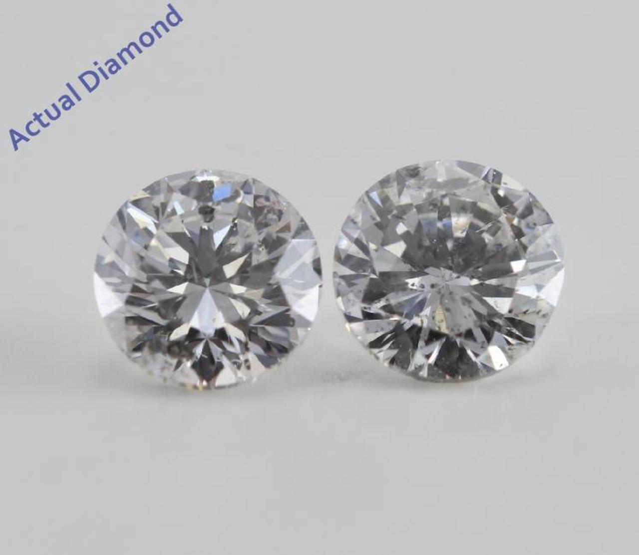 A Pair of Round Cut Loose Diamonds (2.06 Ct, F-G ,I1-SI3)