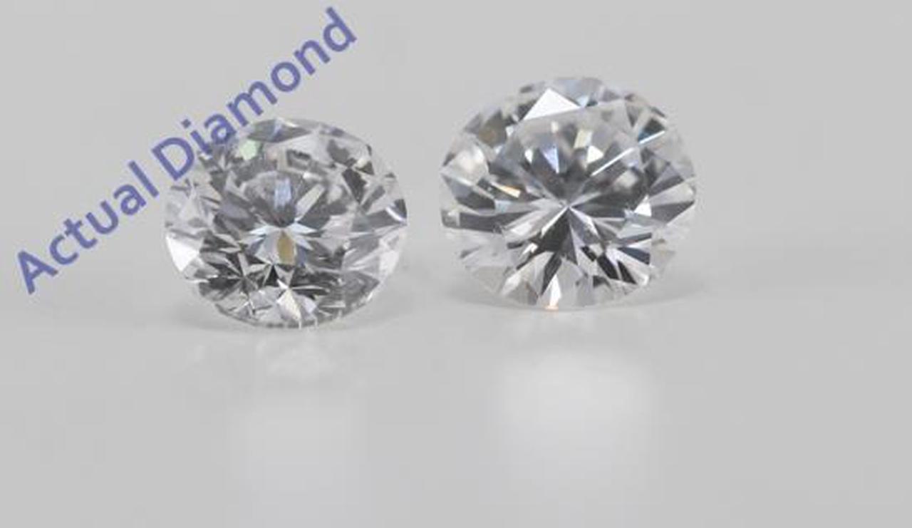 A Pair of Round Cut Loose Diamonds (0.62 Ct, D Color, VVS2 Clarity)