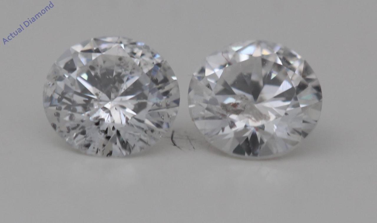 A Pair of Round Cut Loose Diamonds (0.56 Ct,G Color,I1 Clarity)