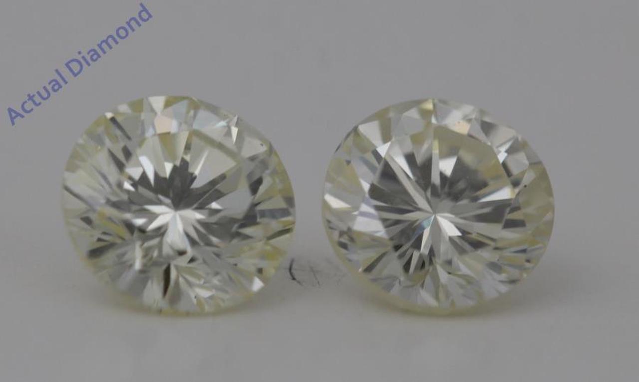 A Pair of Round Cut Loose Diamonds (1.41 Ct,L Color,VS2 Clarity)