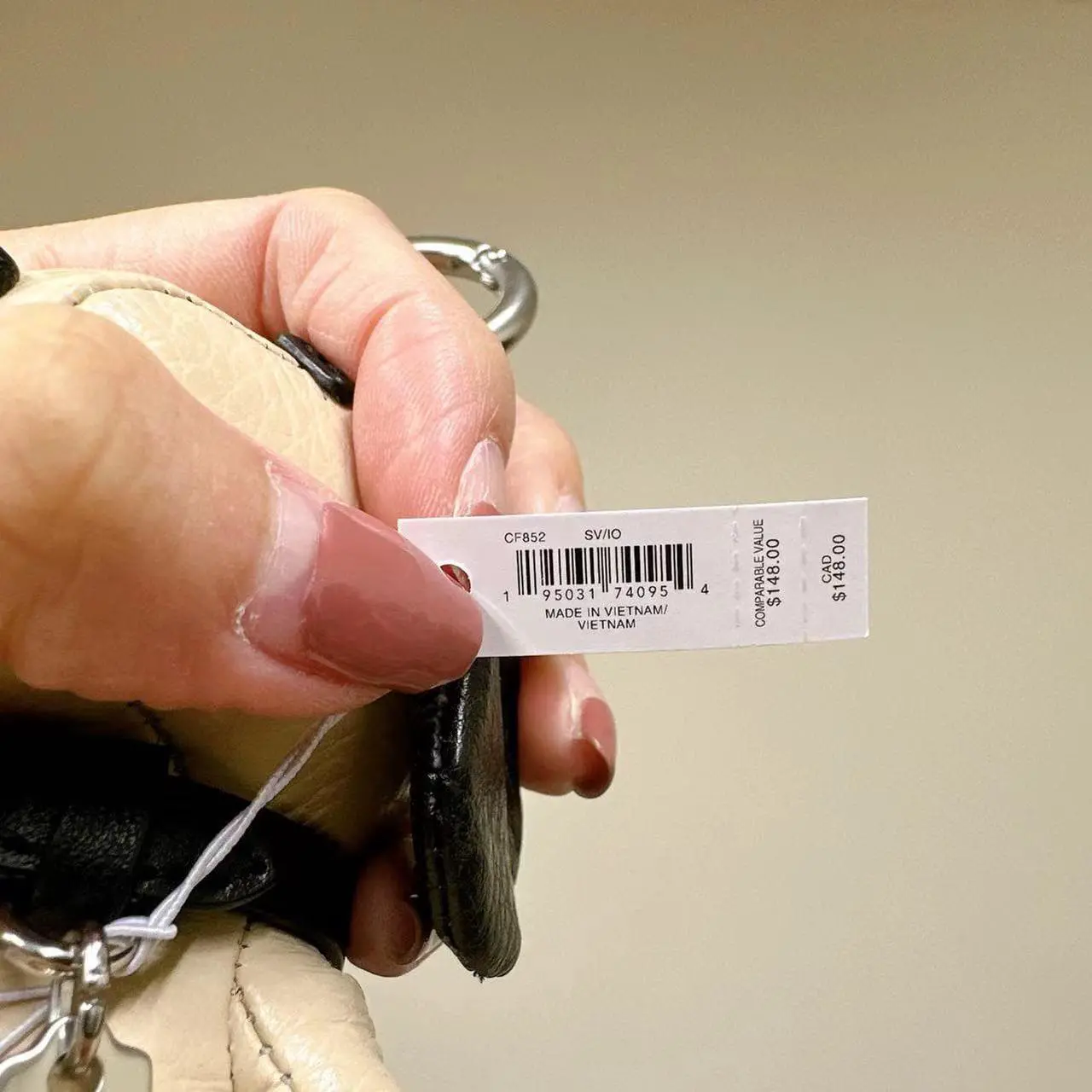 Alt view image 4 of 4 - Coach CF852 Coach X Peanuts Snoopy Collectible Bag Charm With Signature Canvas Silver/Ivory Multi
