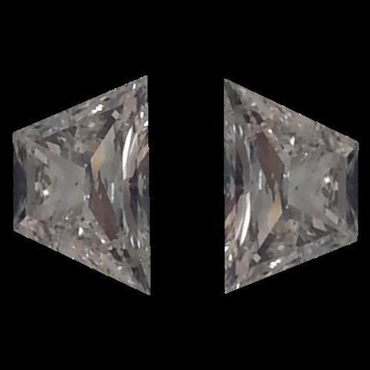 A Pair of Trapezoid Brilliant Cut Cut Loose Diamonds (0.68 Ct, I-J ,VS1-VS2)