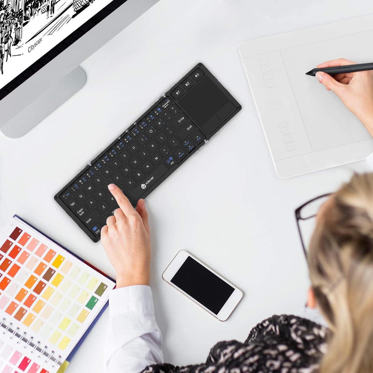 Alt view image 6 of 7 - iClever Foldable Keyboard, BK08 Bluetooth Keyboard with Sensitive Touchpad (Sync Up to 3 Devices), Pocket-Sized Tri-Folded Portable Keyboard for iPad Mac iPhone Android Windows iOS, Silver