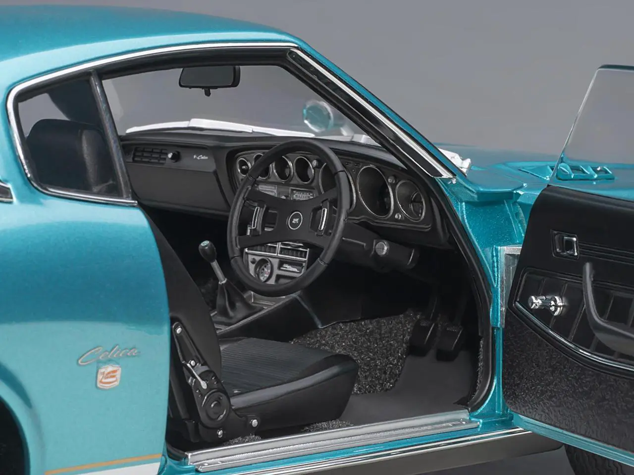 Alt view image 4 of 9 - 1973 Toyota Celica Liftback 2000GT (RA25) RHD (Right Hand Drive) Turquoise Blue Metallic 1/18 Model Car by Autoart