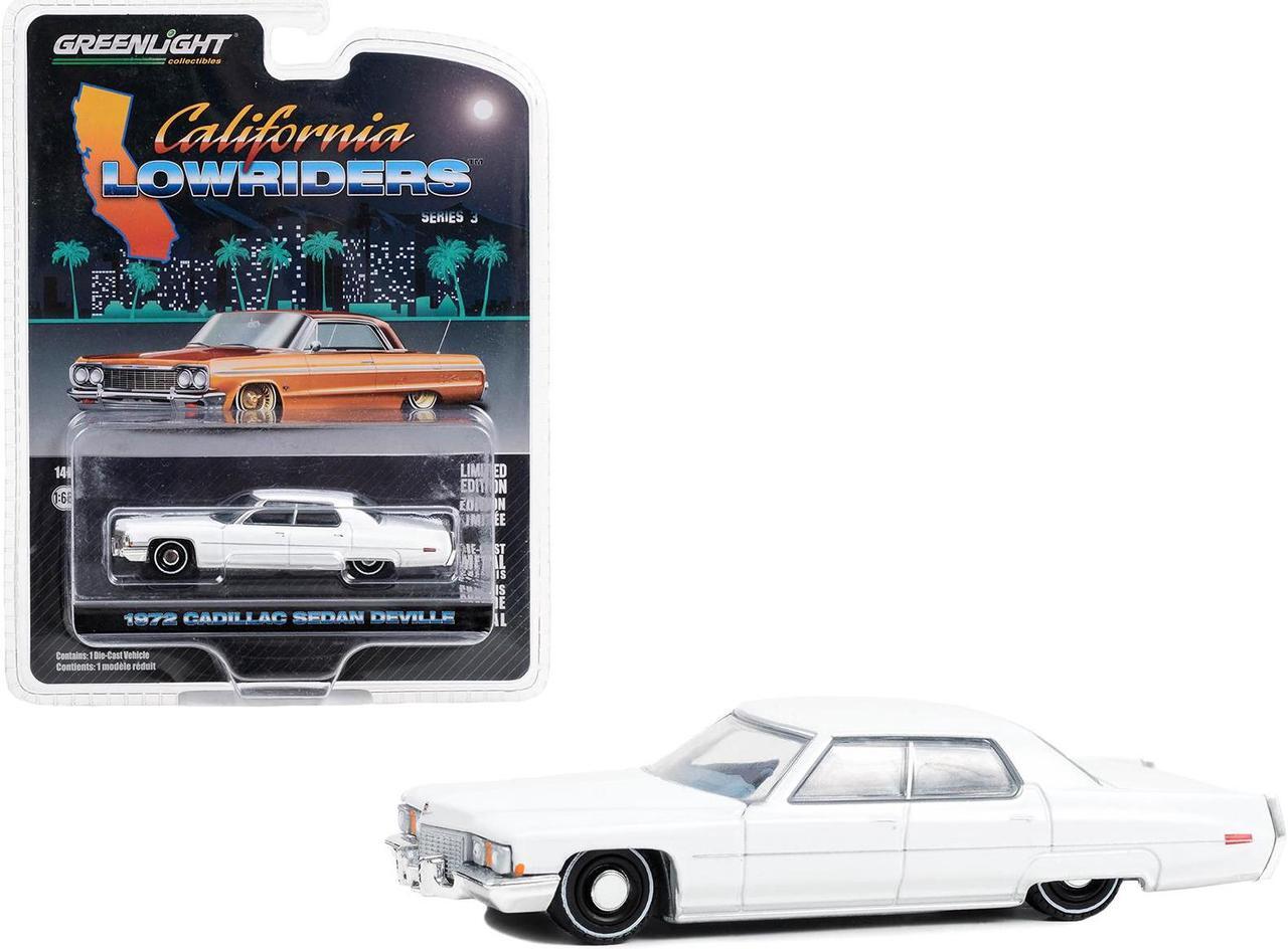 Main image of 1972 Cadillac Sedan deVille Lowrider Cotillion White with Blue Interior 1/64 Diecast Model Car by Greenlight