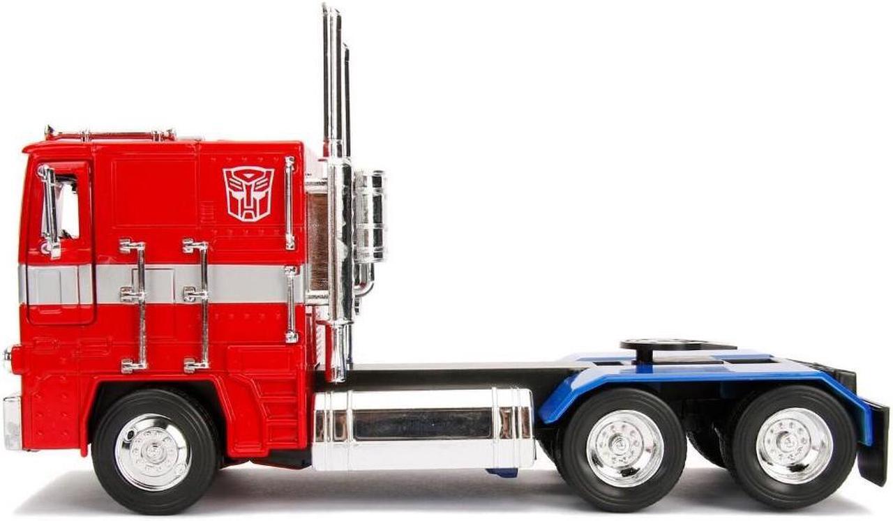 Alt view image 10 of 10 - G1 Autobot Optimus Prime Truck Red w/Robot on Chassis from "Transformers" TV Series "Hollywood Rides" 1/24 Diecast Model by Jada