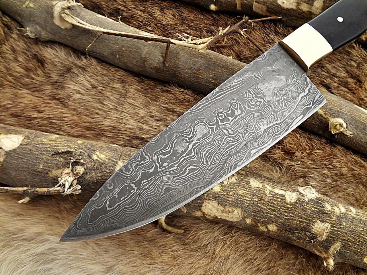 Alt view image 3 of 6 - Damascus Steel Kitchen Knife 10 Inches Long Twist Pattern Hand Forged Damascus Steel Blade, Bull Horn and Brass Bolster Scale