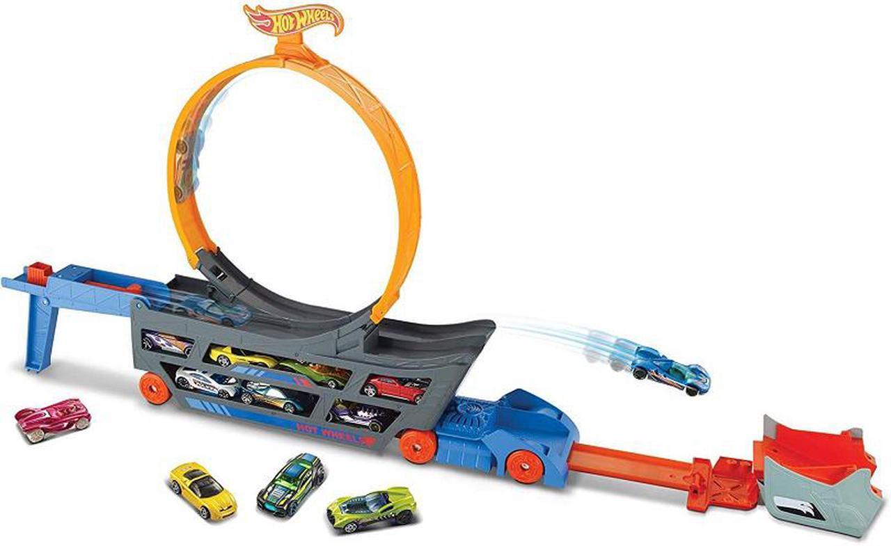Alt view image 2 of 2 - hot wheels transporter truck mobile play set large loop collapsible launcher room for 18 die-cast 1:16 vehicles ages 3 and up