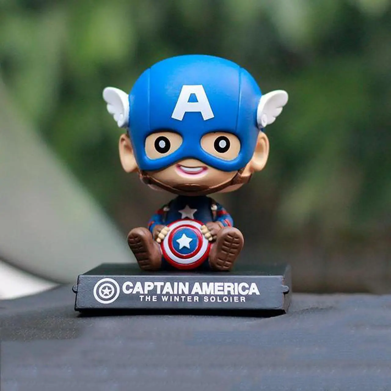 Main image of Cute Mini 10cm Captain America Car Decoration Creative Cartoon Phone Stand Holder (Color: Blue)