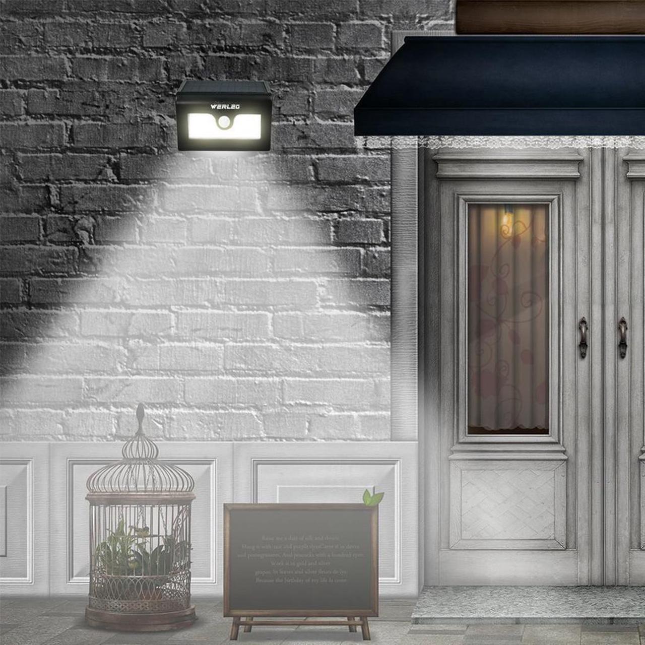 Alt view image 7 of 7 - Solar Lights Werleo 50 LED Bright Solar Powered Wireless Waterproof Outdoor Motion Sensor Security Light Dusk to Dawn Motion Activated Light 3 Modes for Patio Deck Yard Garden Path Outside Wall Light