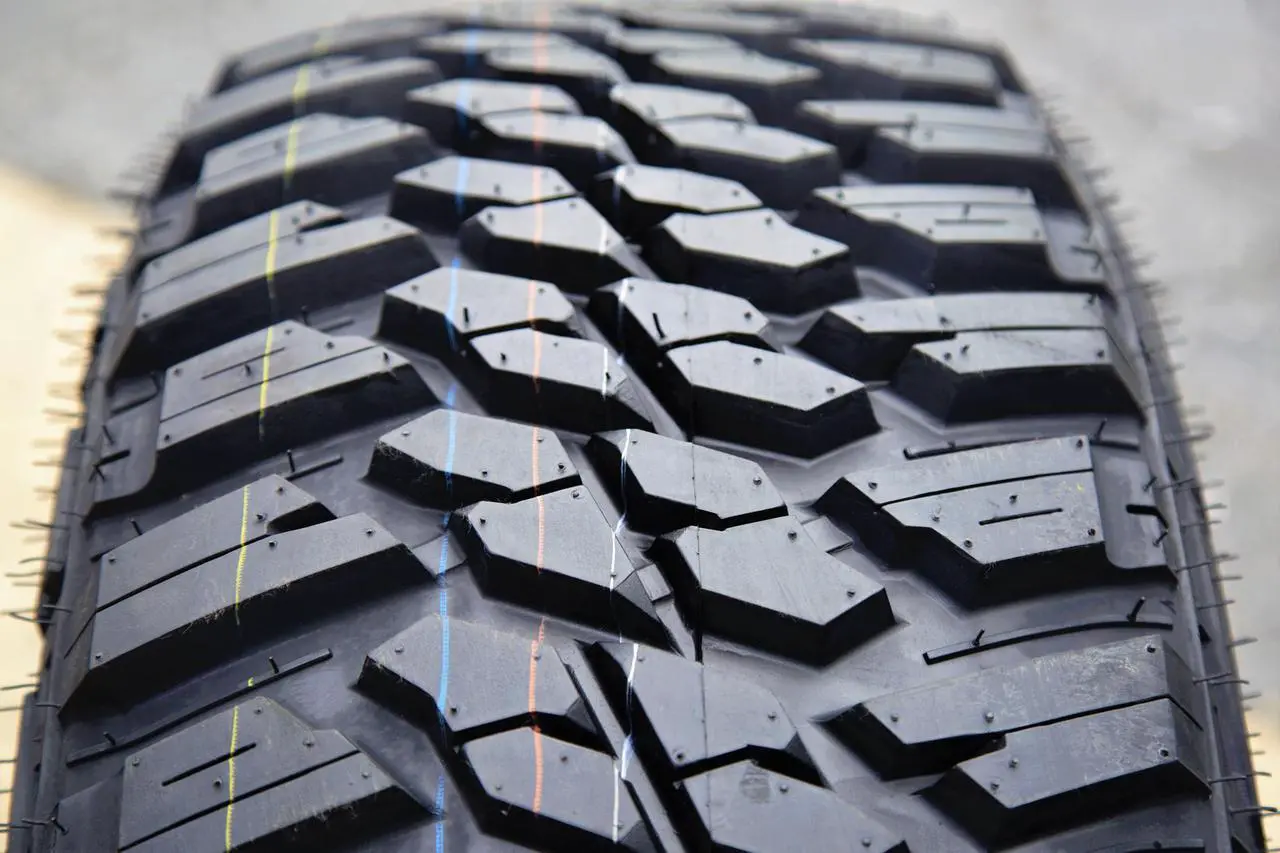 Alt view image 5 of 7 - 265/70R17 121/118Q E (10 Ply) - Kanati Mud Hog M/T Mud Tire