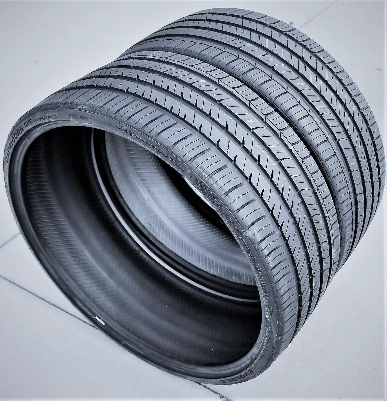 Alt view image 4 of 7 - 255/30R24 97W XL - Evoluxx Capricorn UHP High Performance All Season Tire