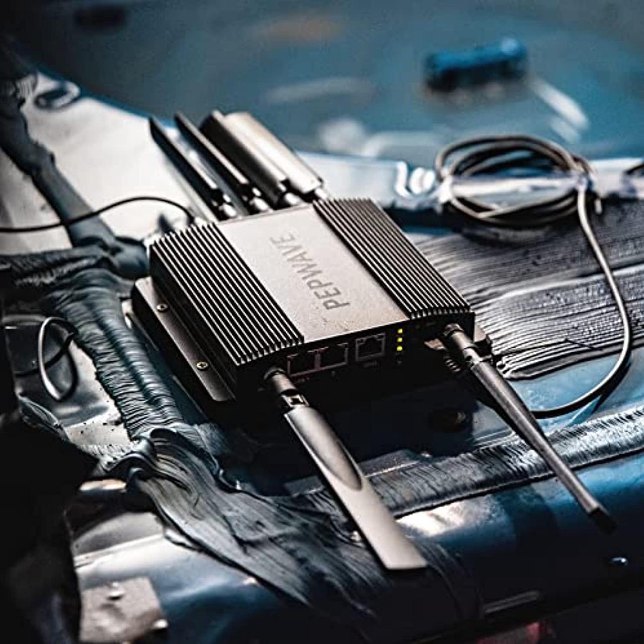 Alt view image 4 of 5 - Peplink MAX BR1 Pro [CAT 20] | LTE-A Pro Modem with Redundant SIM Slots | Wi-Fi 6 | GPS Receiver| Drop-in Mode, Load Balancing/Failover, Ignition Sensing | MAX-BR1-PRO-GLTE-S-T-PRM