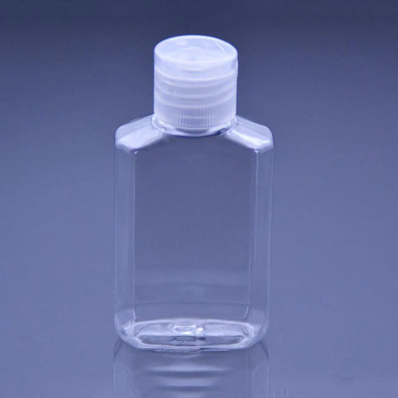 Alt view image 3 of 3 - Travel Size 2 Ounce , PET Clear Plastic Empty Squeeze Bottles with Flip Cap , BPA-free, Pack of 5, safe for hand sanitizer,  hair and skin care products.