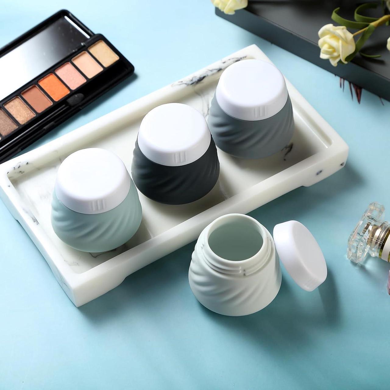 Alt view image 6 of 7 - Travel Containers for Toiletries Silicone Cream Jars TSA Approved Travel Size Containers with Clear Bag Leak-proof Travel Accessories with Lid for Cosmetic Face Body Hand Cream (4 Pack)