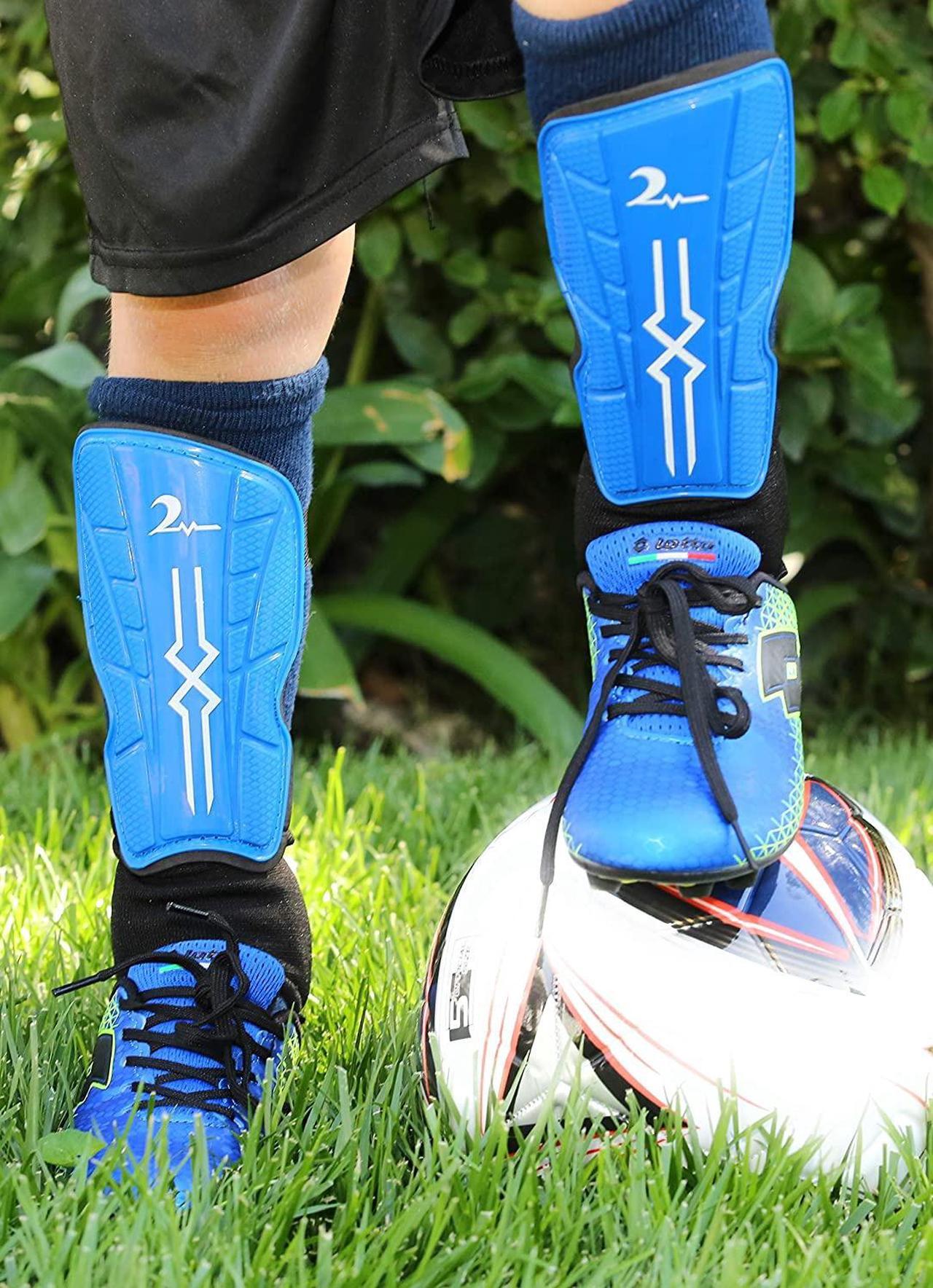 Alt view image 5 of 7 - Combination Set Kids Soccer Shin Guards with Adjustable Straps & 1 Pair Matching Compression Sock for Maximum Performance. Fits Ages 4-7. Blue