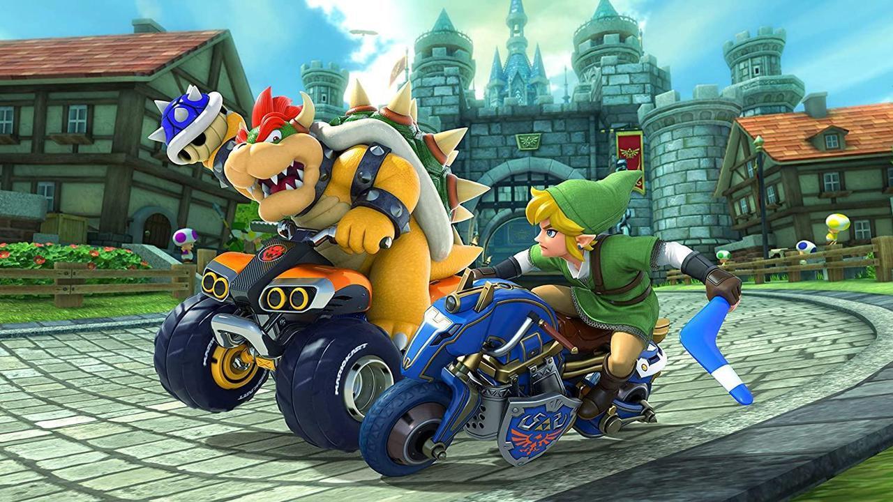 Alt view image 5 of 7 - Nintendo Switch OLED Console Mario Kart 8 Bundle with Paper Mario: the Thousand Year Door, Nintendo $20 eShop Gift Card, MightySkins Console and Controller Skin Voucher, and 1 Year CPS Extended Warra
