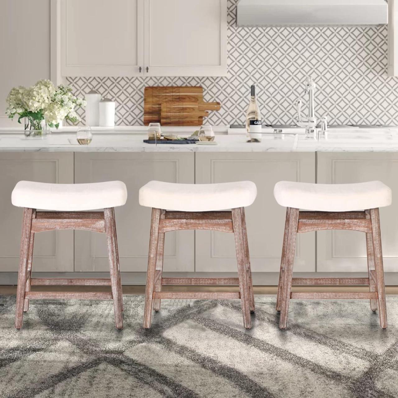 Alt view image 7 of 7 - ALPHA HOME Bar Stools Set of 4, Solid Wood Saddle Kitchen Stools with Beige Linen Fabric Cushion Counter Height Barstools with Vintage Farm Wooden Base for Kitchen Dining Cafe, 24 Inch, Beige, 4PCS