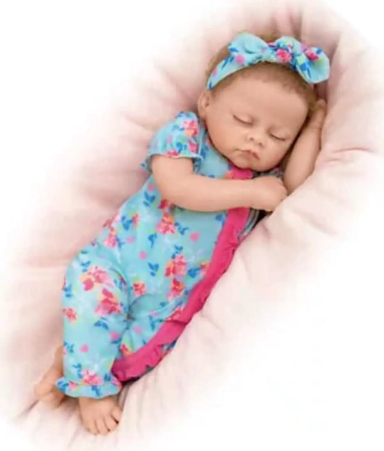 Main image of The Ashton - Drake Galleries Bella Authentic Silicone Baby Doll "Breathes" And "Coos" with Custom Floral Sleeper & Headband TrueTouch® Authentic Silicone Sleeping Doll by Linda Murray 19-inches