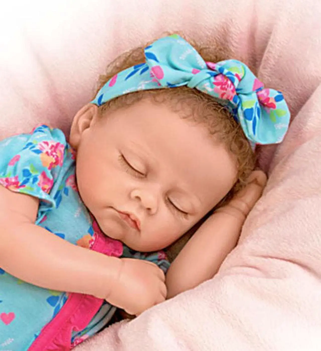 Alt view image 2 of 7 - The Ashton - Drake Galleries Bella Authentic Silicone Baby Doll "Breathes" And "Coos" with Custom Floral Sleeper & Headband TrueTouch® Authentic Silicone Sleeping Doll by Linda Murray 19-inches