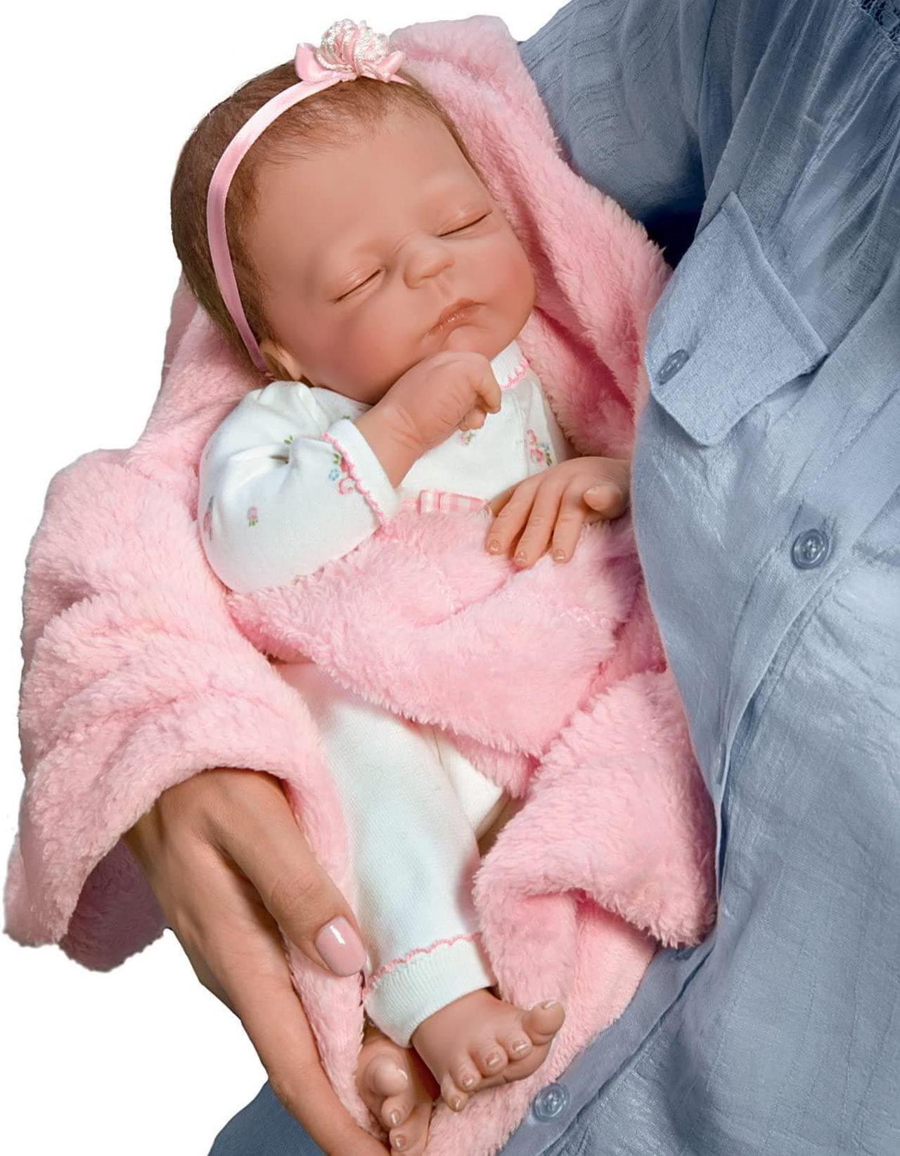 Alt view image 4 of 4 - The Ashton-Drake Galleries "Cuddle Caitlyn" with Warming Feature & Blanket So Truly Real® Vinyl Skin Weighted Baby Doll Lifelike & Realistic Newborn Baby Doll 17-inches