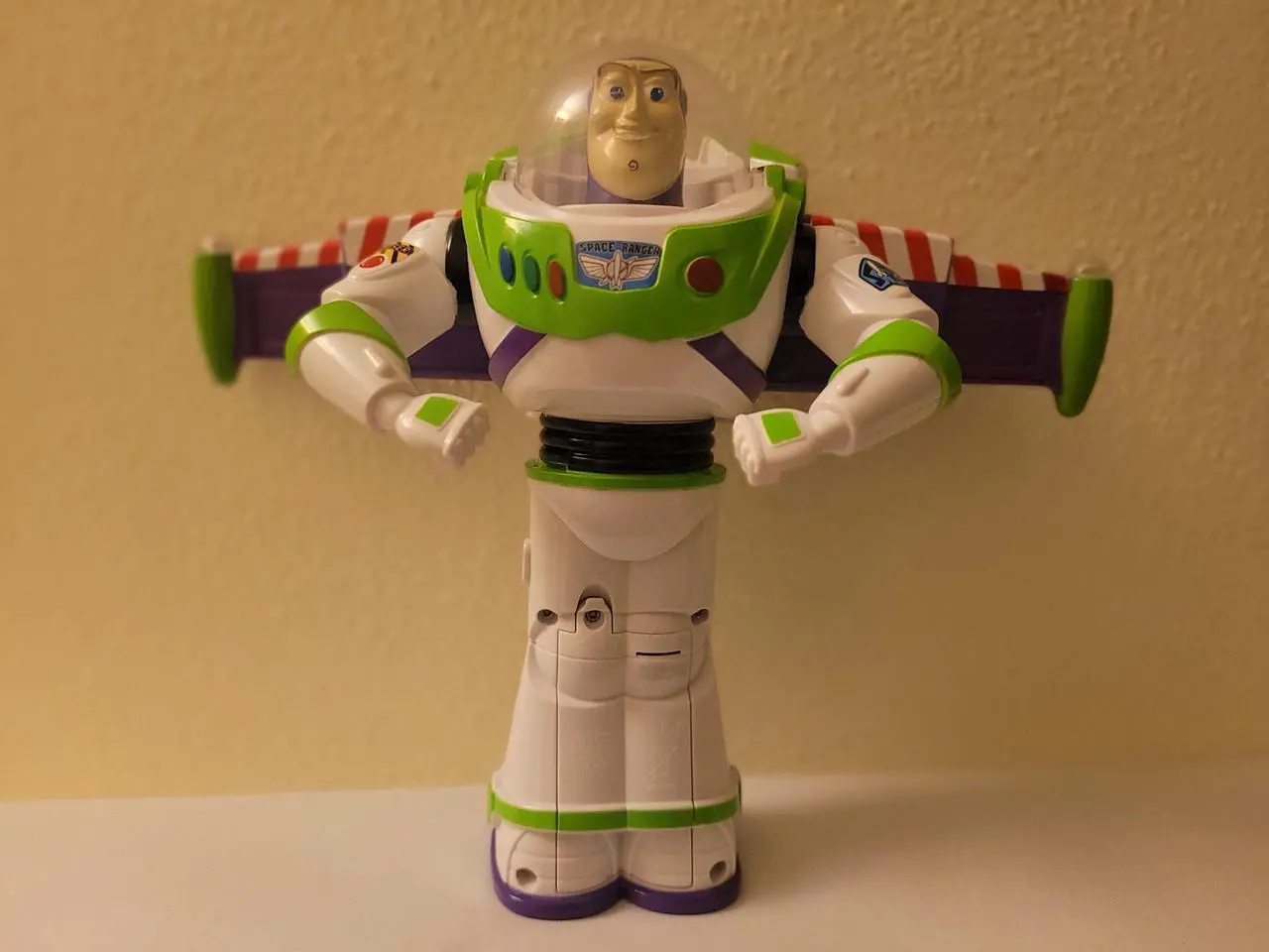 Main image of Disney Pixar Toy Story Buzz Lightyear Glow Spinner 12" Lights Sounds Talking Spinning