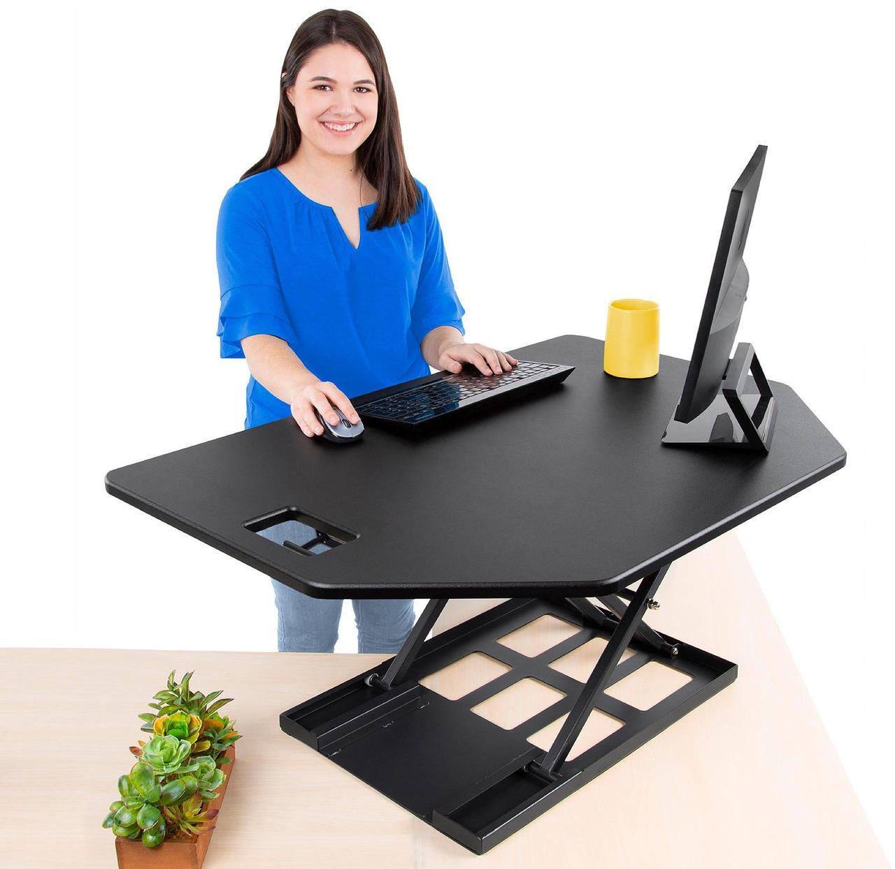 Main image of Stand Steady X-Elite Pro | Premier Corner Standing Desk Converter | Extra Large 40 Inch Sit to Stand Desk | Fully Assembled | Height Adjustable Desk Converter for Cubicles and L-Shaped Desks (Black)