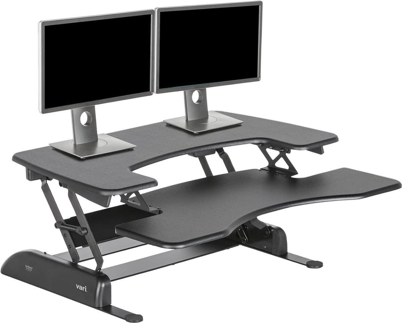 Main image of Vari VariDesk Pro Plus 36 - Adjustable Desk Converter with 11 Height Settings - Laptop Sit Stand Desk Riser for Table Tops and Home Office- Fully Assembled with Spring Loaded Lift- Black