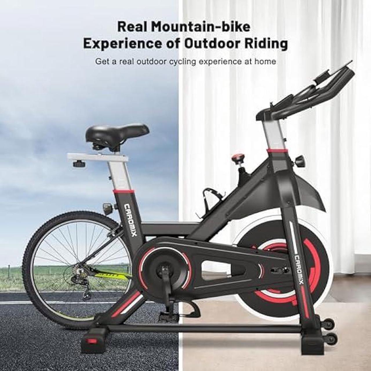 Alt view image 4 of 5 - Caromix Exercise Bike Indoor Stationary Bike with Comfortable Seat Cushion, Monitor with Pulse & Ipad Mount for Home Cardio Gym with 300lbs Weight Capacity