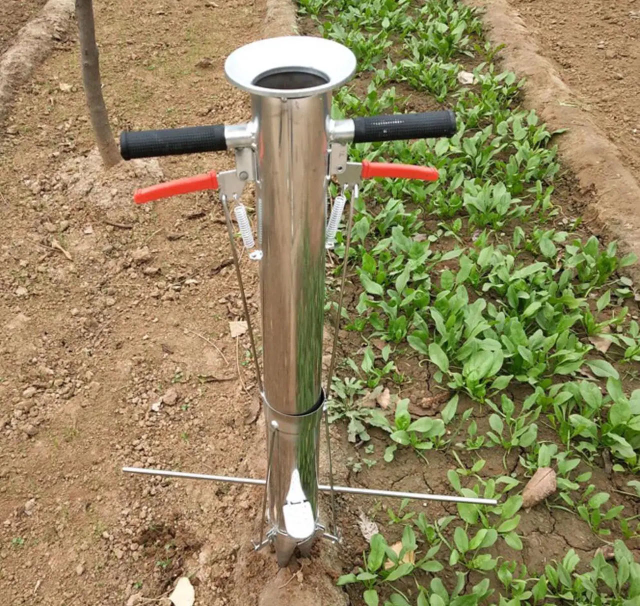 Alt view image 2 of 7 - Seedling Transplanting Tool Stainless Steel Bulb Planter Tool,Multi-Functional Vegetable Seedling Transplanter Manual Hand-Held Young Plant Garden Greenhouse with Pedal(Double Handle)
