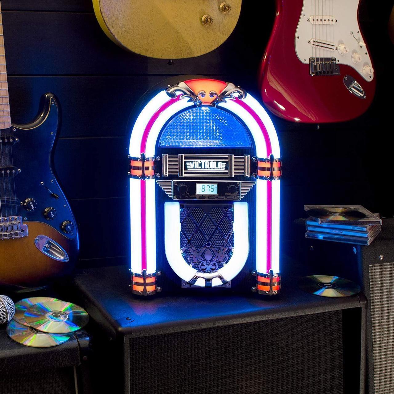 Alt view image 2 of 2 - Victrola Nostalgic Wood Countertop Jukebox with Built-in Bluetooth Speaker, 50's Retro Vibe, 5 Bright Color-Changing LED Tubes, FM Radio, Wireless Music Streaming, AM/FM Radio, Aux Input