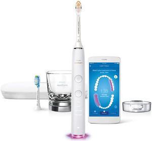 Philips Sonicare DiamondClean Smart 9300 Electric Toothbrush, Sonic Toothbrush with App, Pressure Sensor, Brush Head Detection, 4 Brushing Modes and 3 Intensity Levels, White, Model HX9903/05