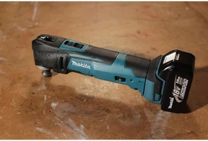 Makita 18 Volt LXT Lithium-Ion Cordless Oscillating Tool (Bare Tool) XMT03Z Makita 18 Volt LXT Lithium-Ion Cordless Oscillating Tool (Bare Tool) XMT03Z