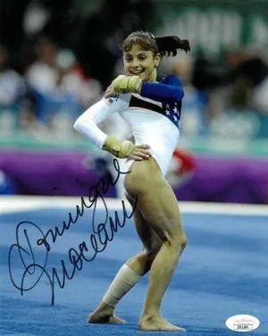 Dominique Moceanu signed 1996 Team USA Atlanta Olympics Gymnastic 8x10 Photo- JSA (Gold Medal/Magnificent Seven)