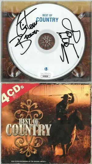 Tanya Tucker & T. Graham Brown dual signed 2006 Madacy Best of Country CD Disc #2- JSA #KK58296
