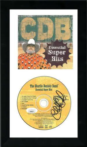 The Charlie Daniels Band signed 2004 Essential Super Hits Album CD 6.5x12 Custom Framing w/ Cover/signed DVD- JSA #KK58157