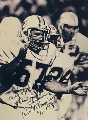 Michael Kolen signed Miami Dolphins Vintage B&W 5x7 Photo with World Champions ’72 ’73 (Captain Crunch)