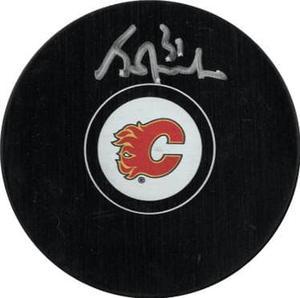 Grant Fuhr signed Calgary Flames Logo Hockey Puck #31- Beckett Witnessed