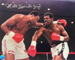 Michael Spinks signed Boxing Collage 8x10 Photo Jinx- AWM Hologram (vs Larry Holmes)
