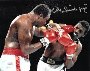 Michael Spinks signed Boxing 8x10 Photo Jinx- JSA (vs Larry Holmes)