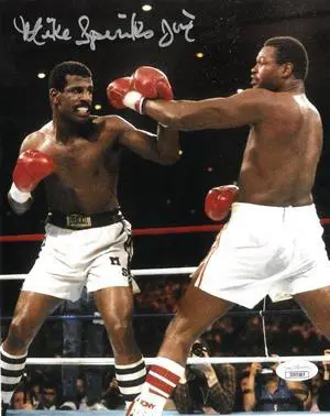 Michael Spinks signed Boxing 8x10 Photo Jinx- JSA (vs Larry Holmes)