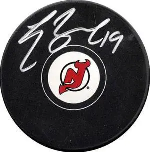 Travis Zajac signed New Jersey Devils Hockey Puck #19- Leaf Authentic Hologram