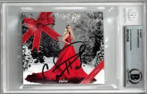 Carrie Underwood signed 2021 My Gift CD 3x4 Art Card- Beckett/BAS Encapsulated Carrie Underwood signed 2021 My Gift CD 3x4 Art Card- Beckett/BAS Encapsulated
