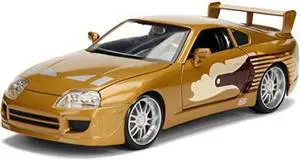 Slap Jack\'s Toyota Supra Gold \Fast & Furious\" Movie 1/24 Diecast Model Car by Jada"