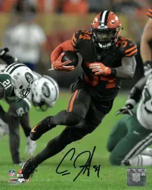 Carlos Hyde signed Cleveland Browns 8x10 Photo #34 (brown jersey)