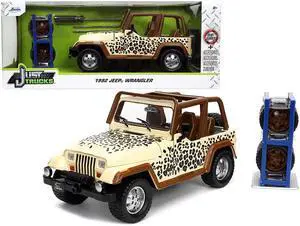 1992 Jeep Wrangler Tan and Brown with Graphics and Extra Wheels "Just Trucks" Series 1/24 Diecast Model Car by Jada