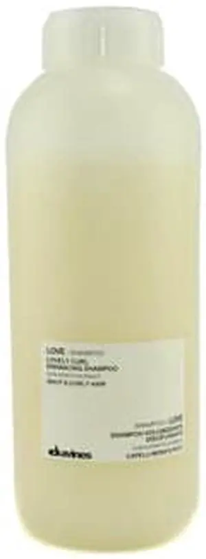Love Lovely Curl Enhancing Shampoo for Wavy & Curly Hair by Davines for Unisex - 33.8 oz Shampoo